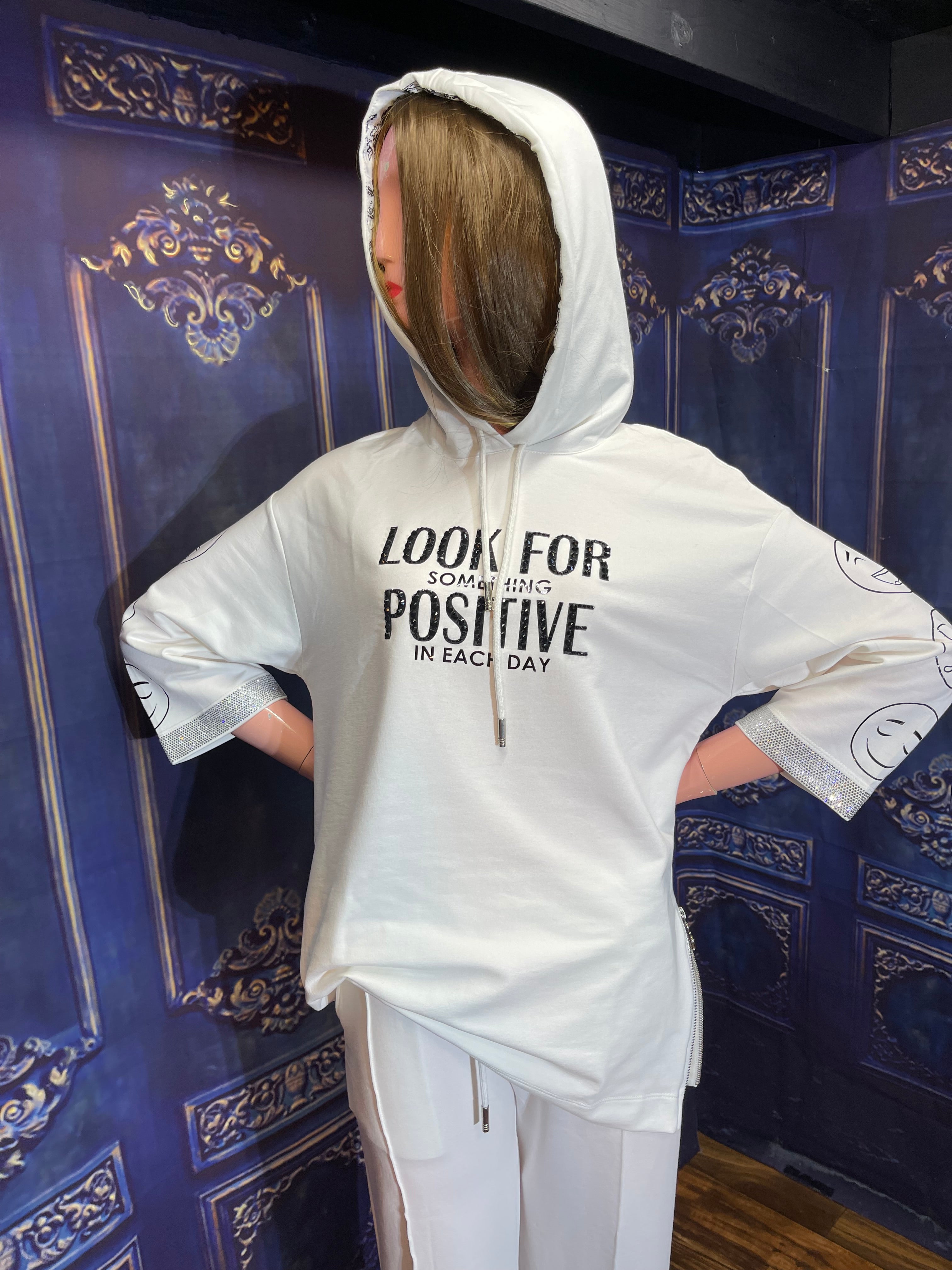 Look for positive woman outfit with hood. Cotton.