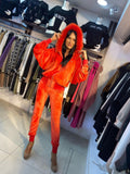 Red royal velour fashion tracksuit for women with crystals and real fur on the hood.