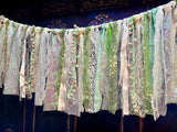 Sparkly green rag tie backdrop, ribbons, cotton,  lace Cottage chic event Garland. Farmhouse valance .